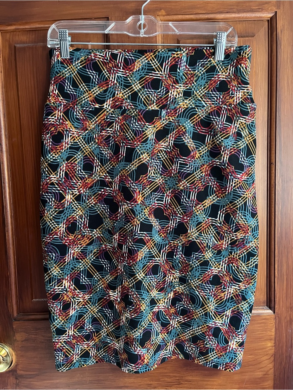LuLaRoe Black Pencil Skirt with Teal, Burgundy & Mustard Pattern